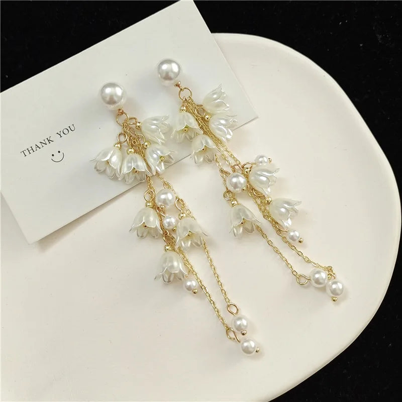 Elegant White Acrylic Flower Tassel Earrings